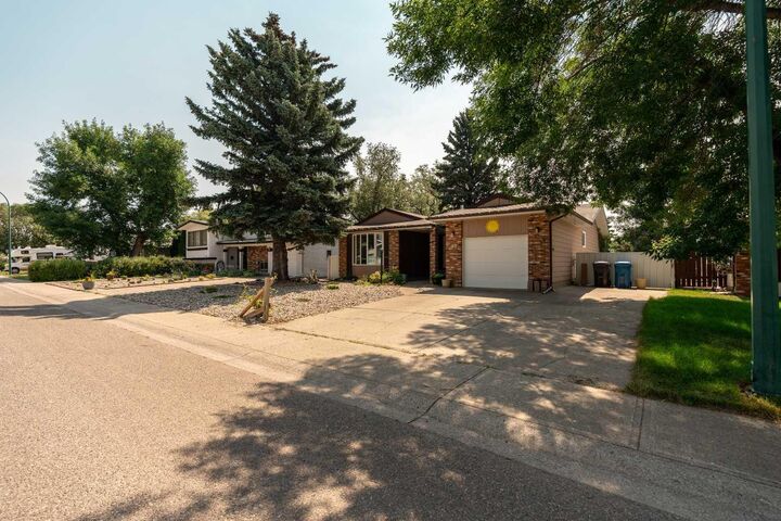 Property Photo: 42 Honeysuckle Road N AB T1H 4J9