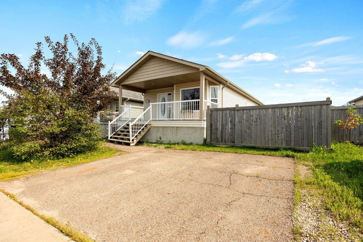Property Photo:  209 Ash Way  AB T9K 0E9 