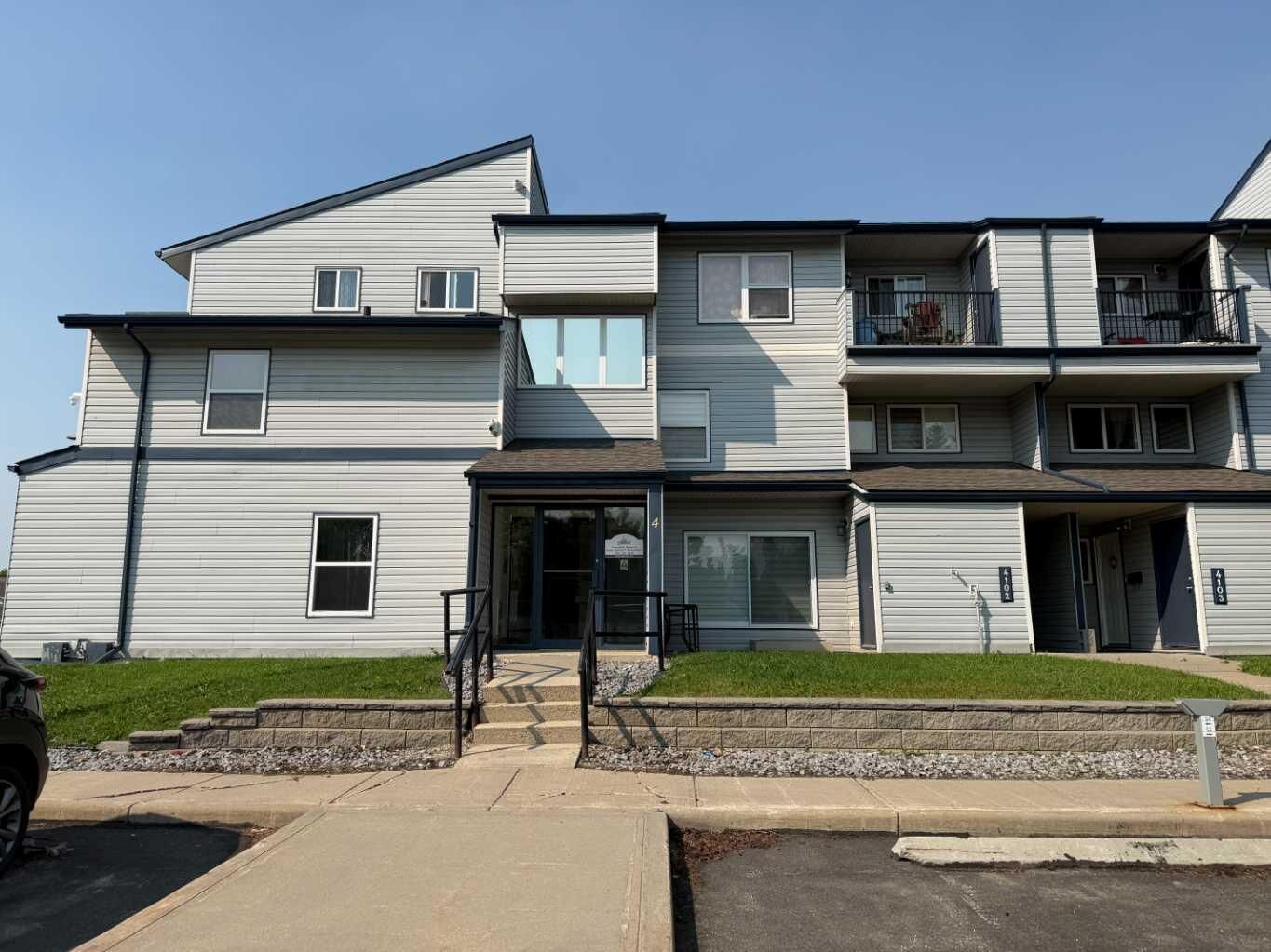 Property Photo:  7201 Poplar 4205  AB T8V 6C5 