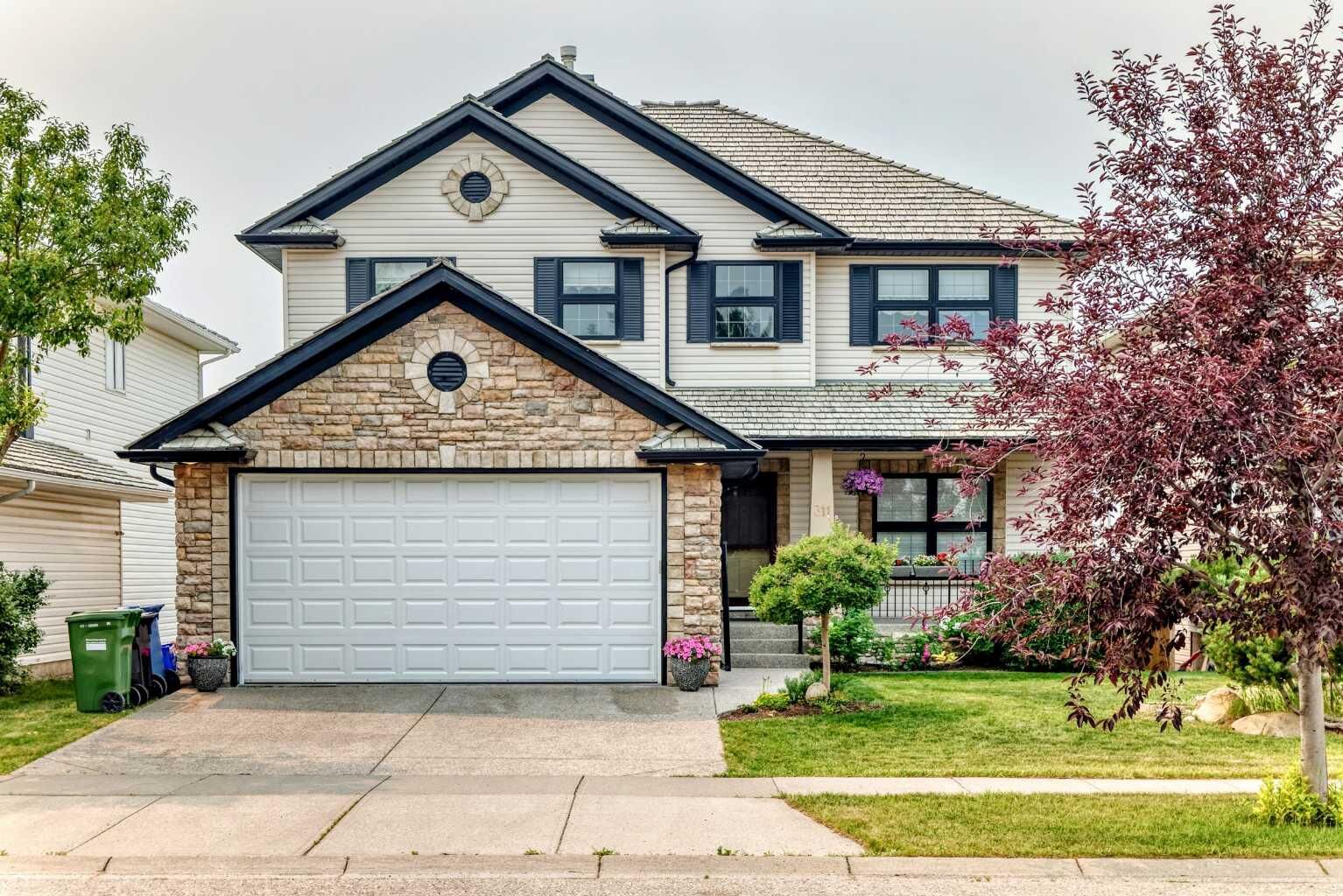 Property Photo: 311 Rocky Ridge Drive NW AB T3G 4P4