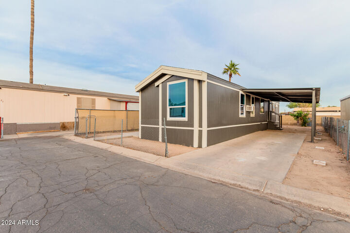 Property Photo: 300 W Lower Buckeye Road 26 AZ 85323