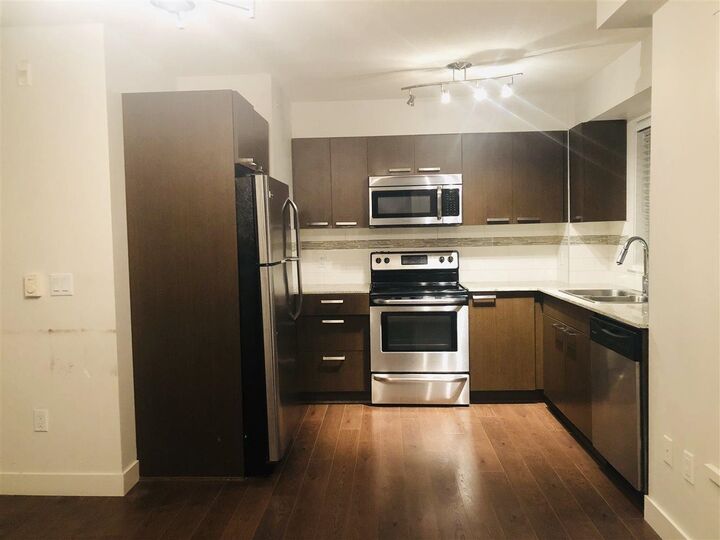 Property Photo: 13883 Laurel Drive 717 BC V3T 1A8