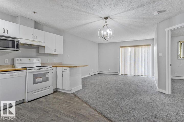 Property Photo:  11325 83 Street NW 130  AB T5B 4W5 
