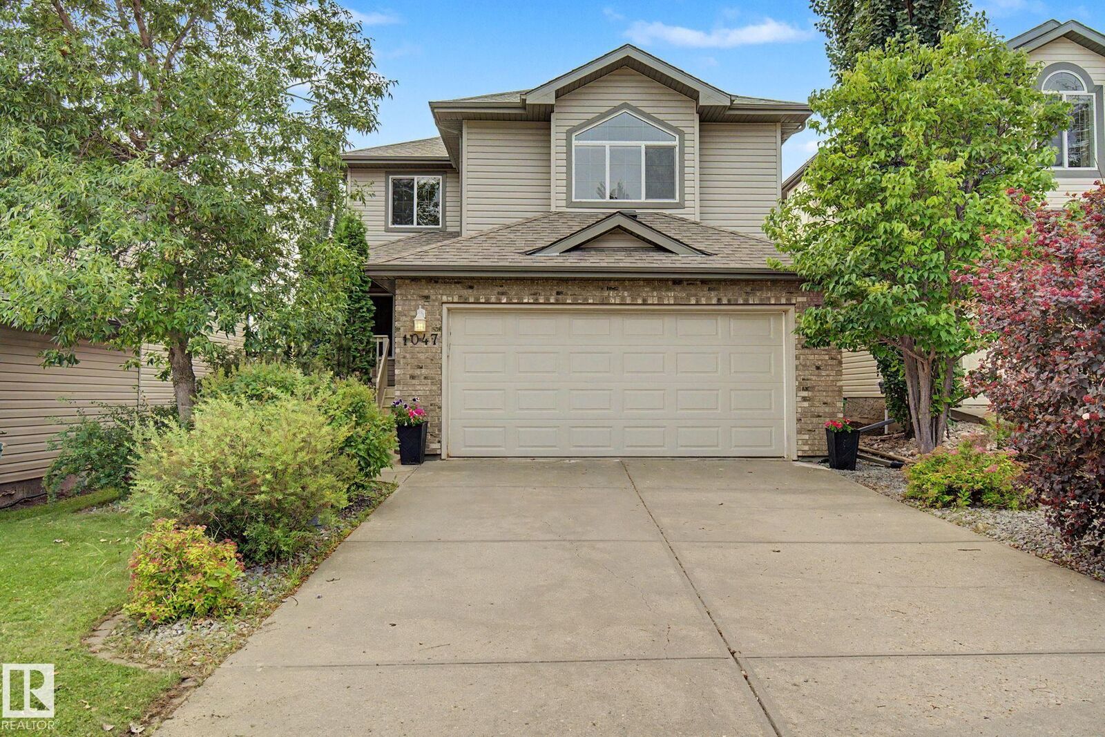 Property Photo: 1047 Leger Boulevard NW AB T6R 3J9