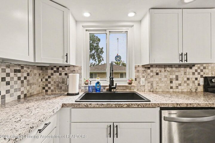 Property Photo:  6120 Marscot Drive  MI 48911 