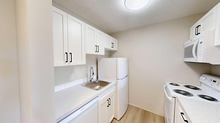 Property Photo: 401 Columbia Boulevard W 311 AB T1K 5R8