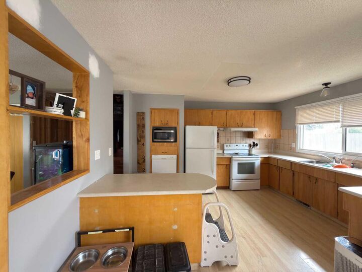 Property Photo:  8302 98 Street  AB T8S 1A4 