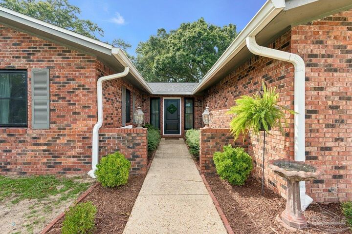 Property Photo:  5745 Talquin Ave  FL 32526 