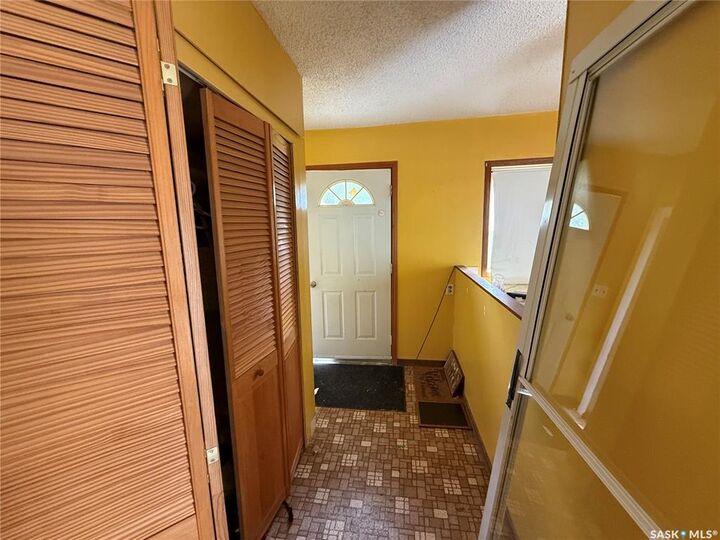 Property Photo:  207 Main Street  SK S4P 2K5 