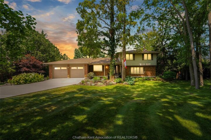 9133 Woodland Crescent — photo 1