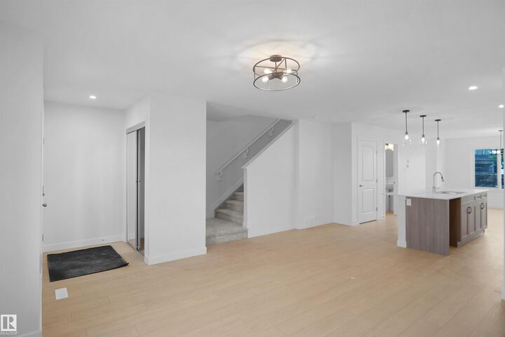 Property Photo:  7385 Keeler Crescent SW  AB T6W 5Z3 