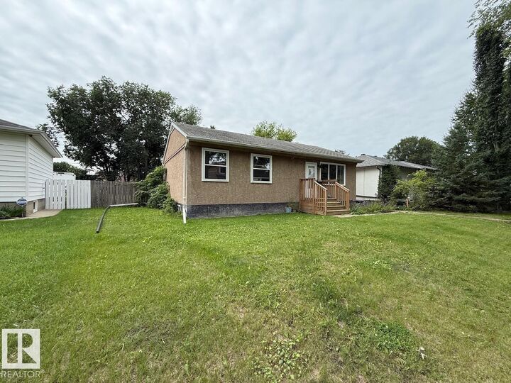 Property Photo:  7607 83 Avenue NW  AB T6C 1A2 
