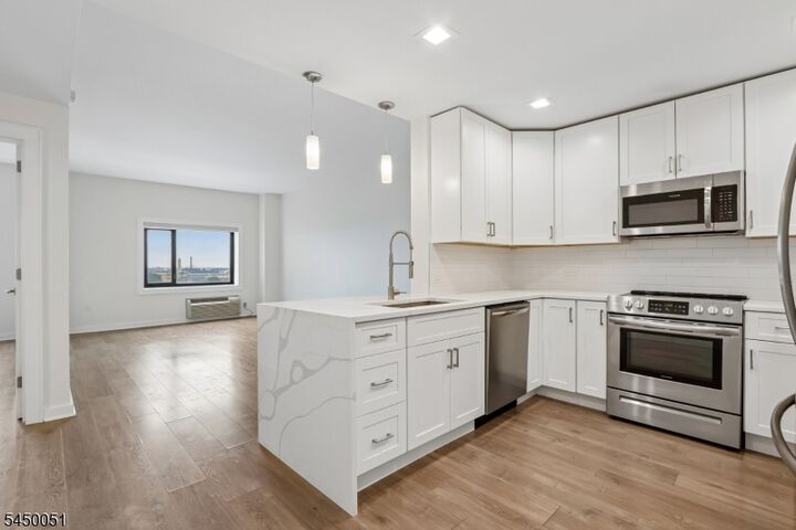 Property Photo:  1 Carriage City Plz 1405  NJ 07065 