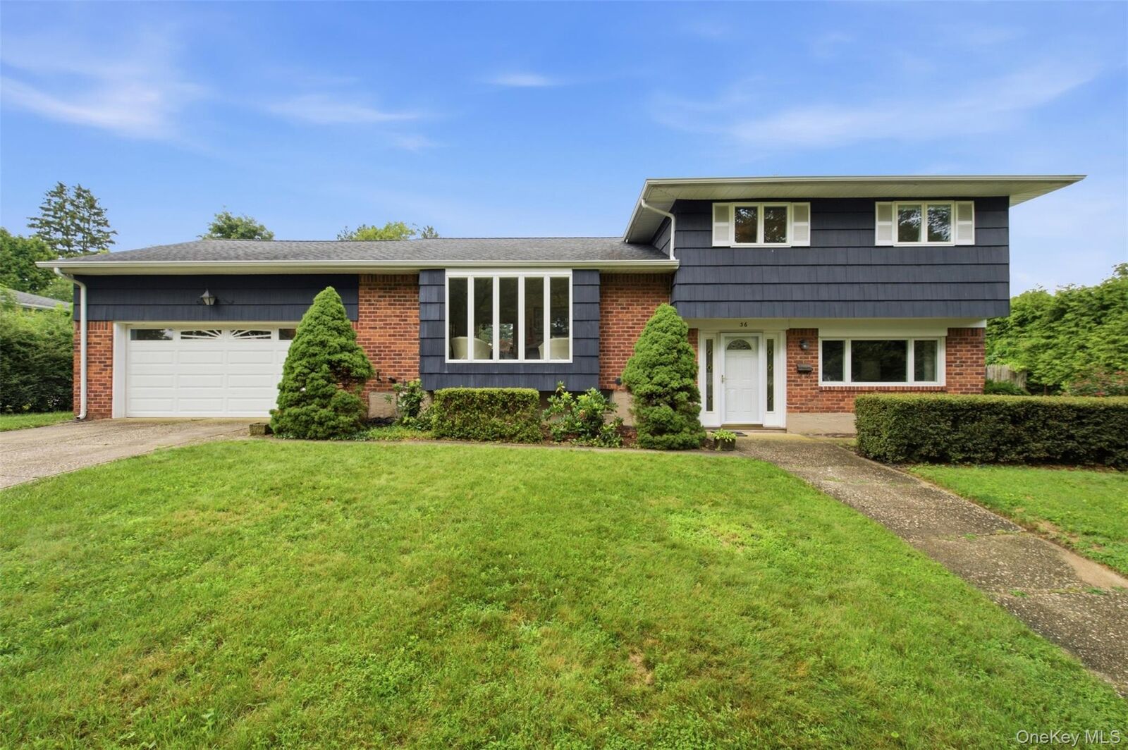 Property Photo: 36 Cherrywood Drive NY 11731