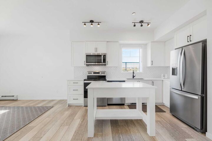 Property Photo:  3727 Sage Hill Drive NW 3104  AB T3R 1T7 