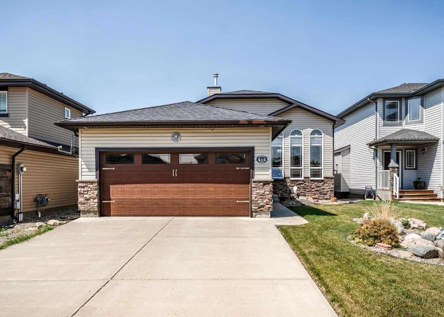 Property Photo: 414 Gateway Crescent S AB T1K 4X2