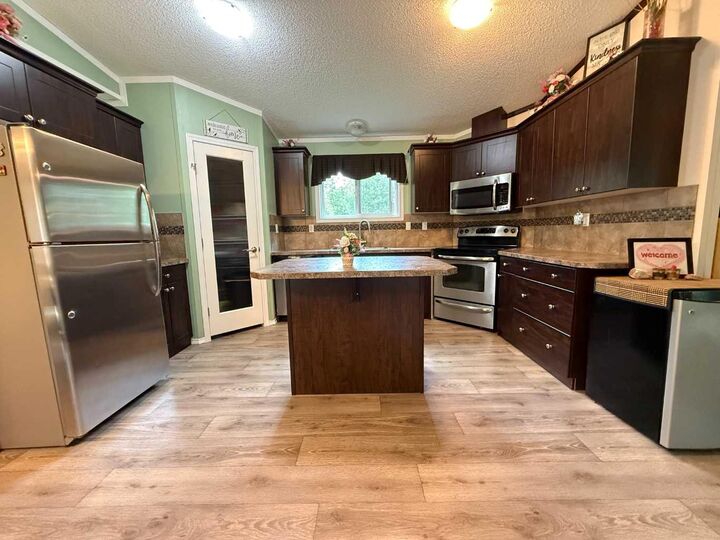 Property Photo: 8 131074 Twp Rd 590 AB T7S 2A2