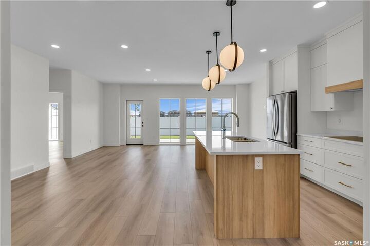 Property Photo:  720 Brighton Boulevard 6  SK S7V 1X1 