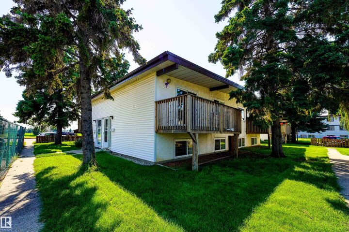 Property Photo:  8920A 144 Avenue NW  AB T5E 5V4 