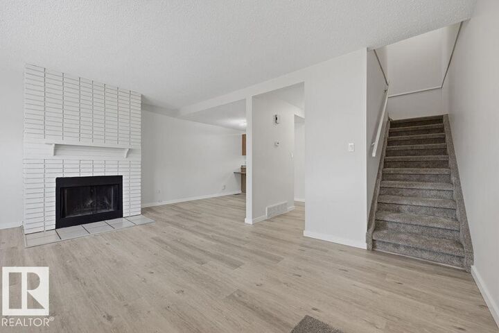 Property Photo:  10473 24 Avenue NW  AB T6J 4S2 