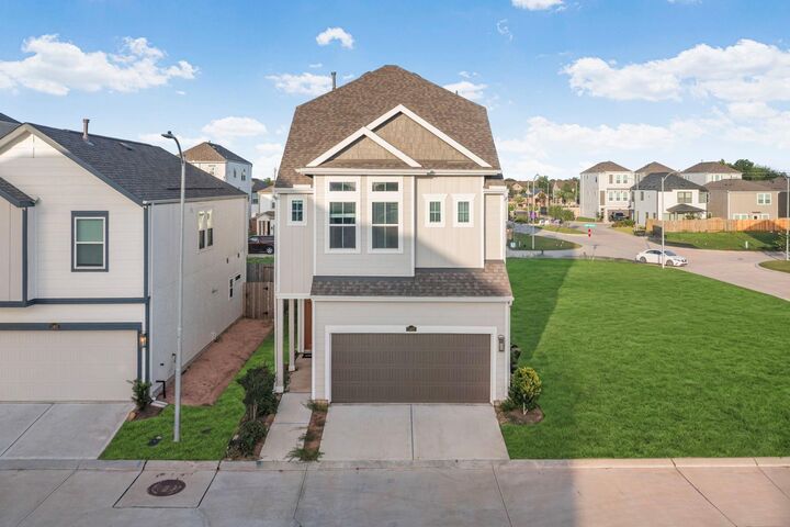 Property Photo: 11407 W Blossom Square Street TX 77047