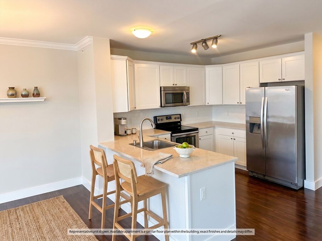 Property Photo:  978 Worcester 411  MA 02482 
