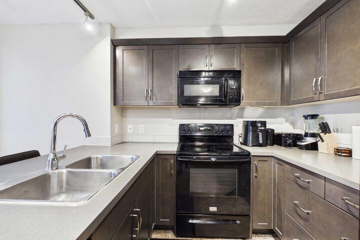 Property Photo:  402 Kincora Glen Road NW 3307  AB T3R 0V2 
