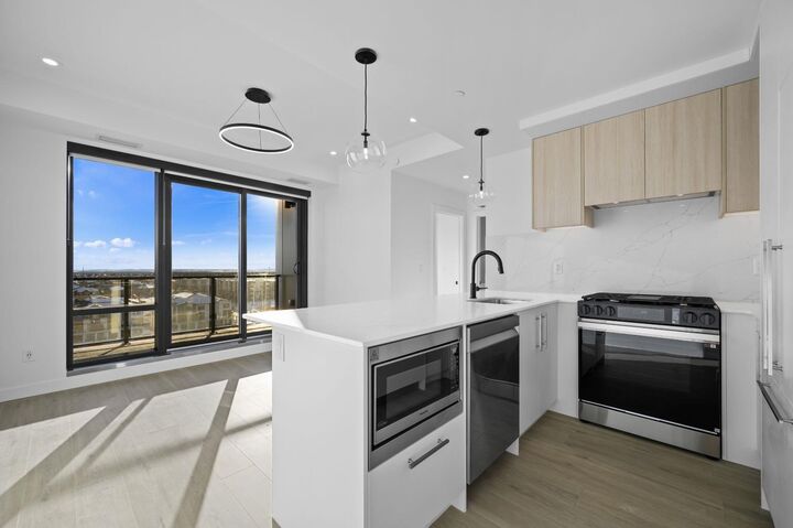 Property Photo: 8375 Broadcast Avenue SW 701 AB T3H 6L3