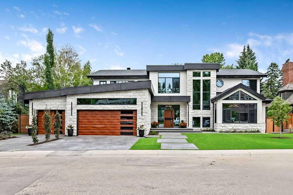 Property Photo: 63 Pumpmeadow Crescent SW AB T2V 5C7