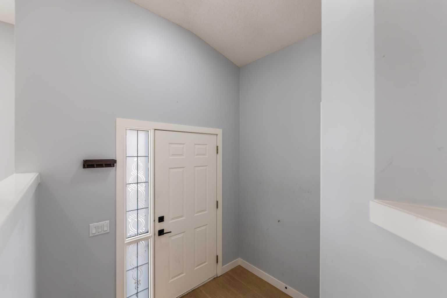 Property Photo:  102 Martin Crossing Grove NE  AB T3J 3M5 