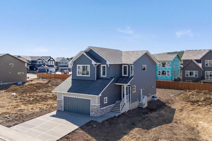 Property Photo: 35 Creekside Rise SW AB T3X 5V9