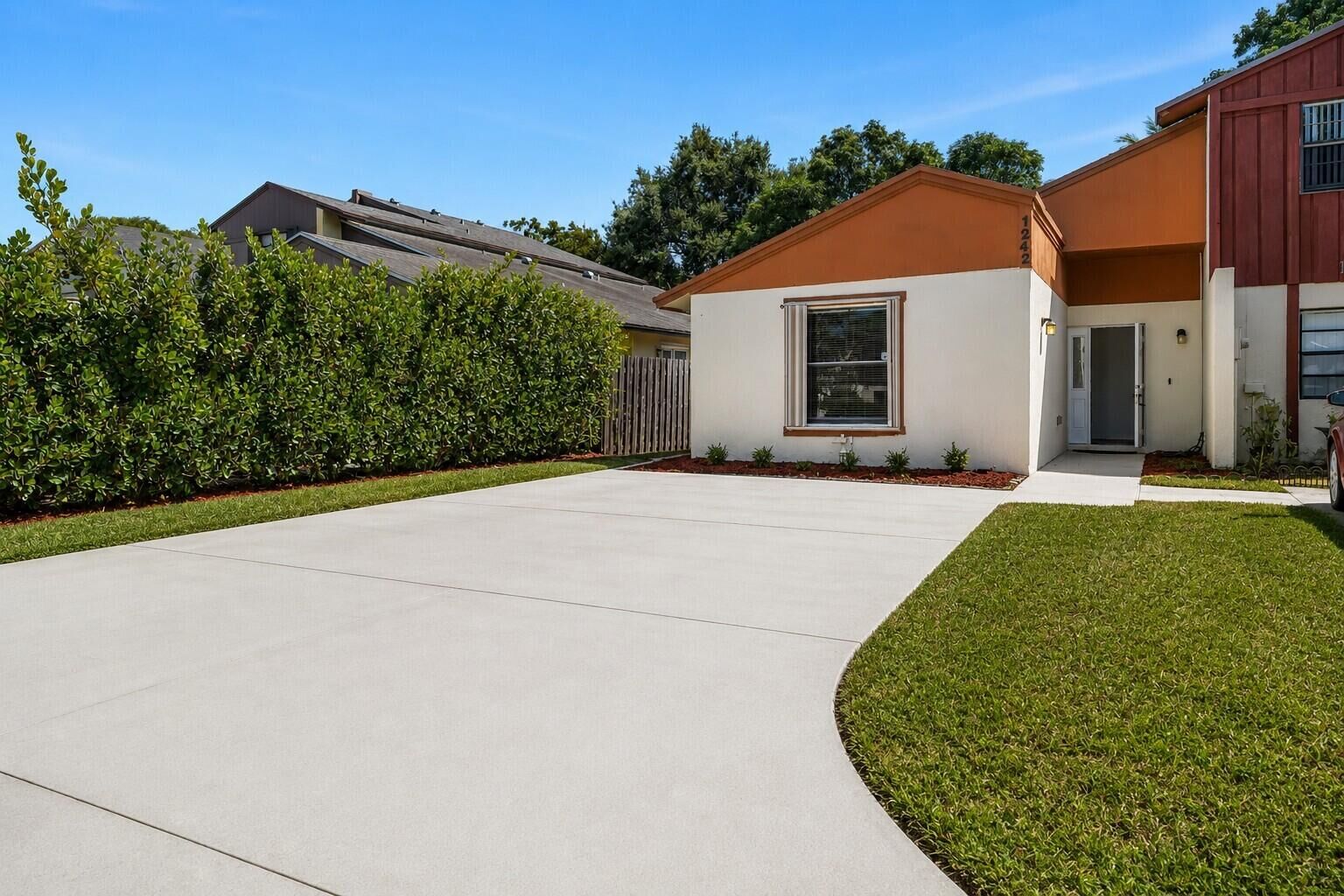 Property Photo: 1242 The 12th Fairway FL 33414