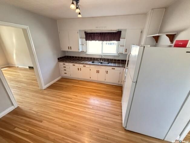 Property Photo:  938 Iroquois Street W  SK S6H 5B6 
