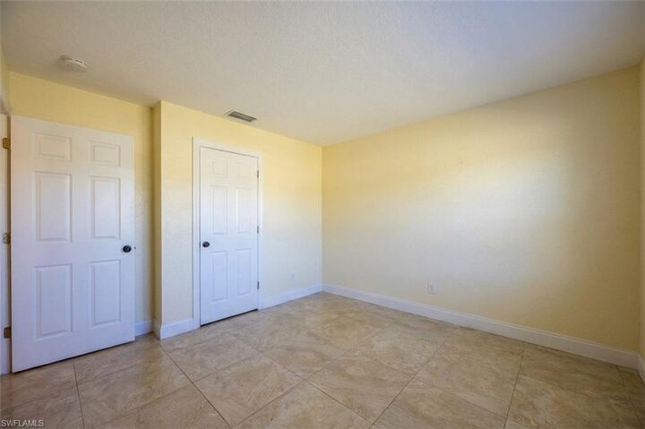 Property Photo:  311 Tudor Dr 1-2  FL 33904 