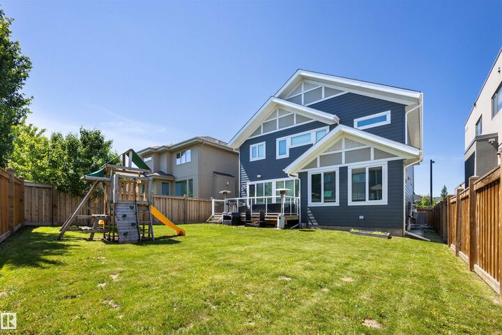 Property Photo: 1305 Hainstock Way SW AB T6W 3B6