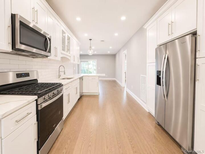 Property Photo:  68-02 Jay Ave  NY 11378 