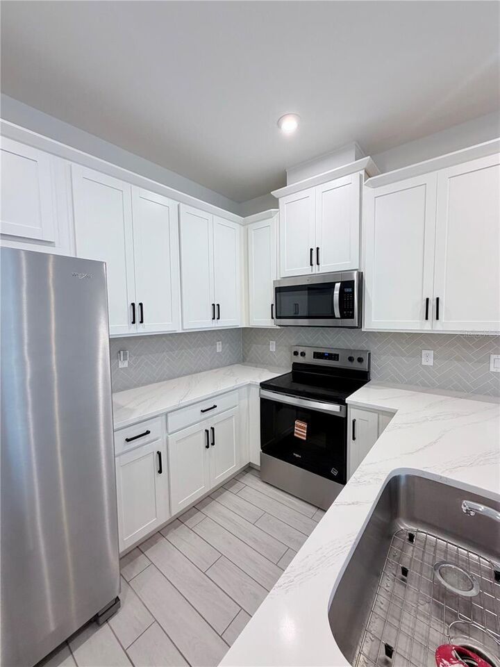Property Photo:  9855 Walkway Dr  FL 32832 