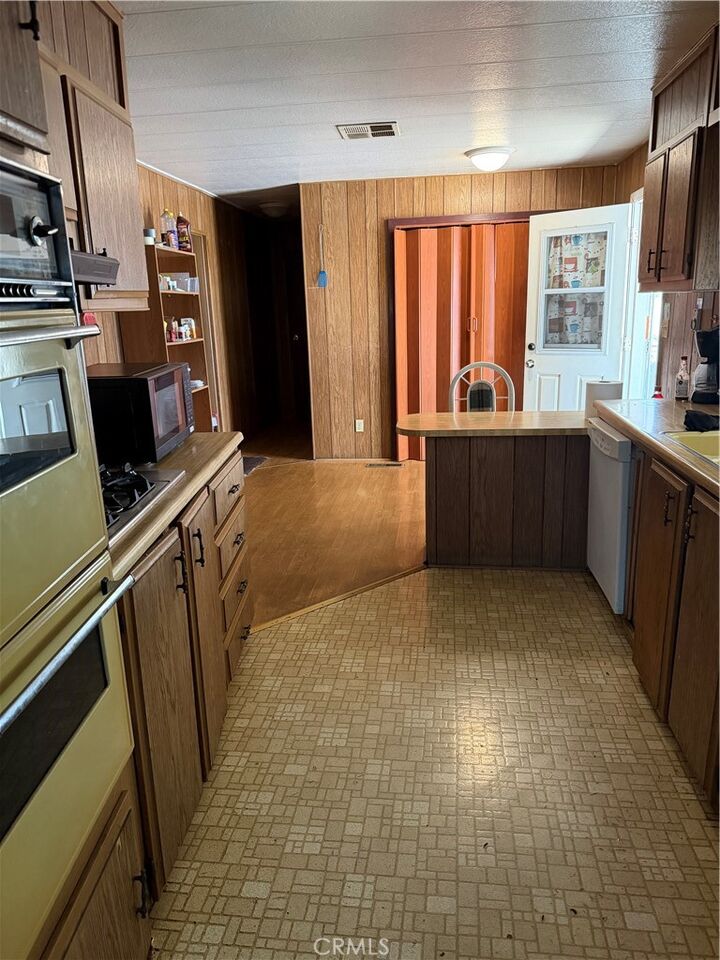 Property Photo: 16860 Slover Avenue 61 CA 92337