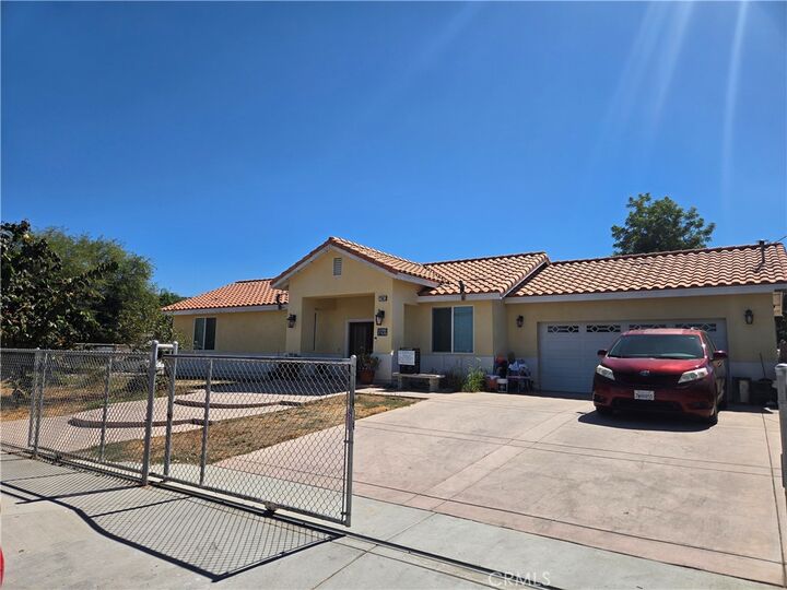 Property Photo:  7961 Pedley  CA 92410 