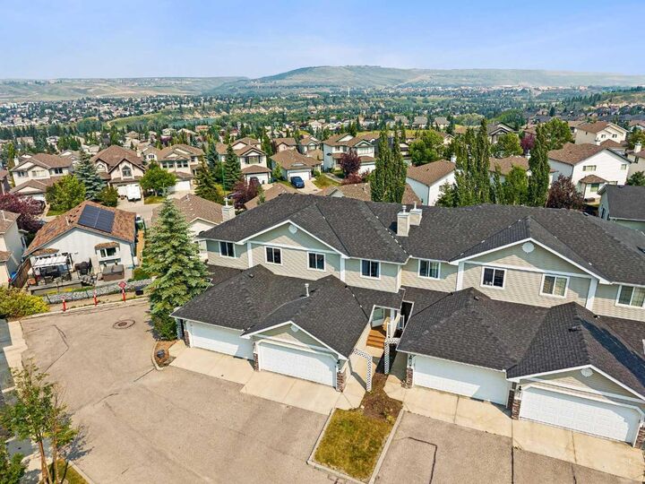 Property Photo:  117 Bow Ridge Drive 10  AB T4C 2G9 