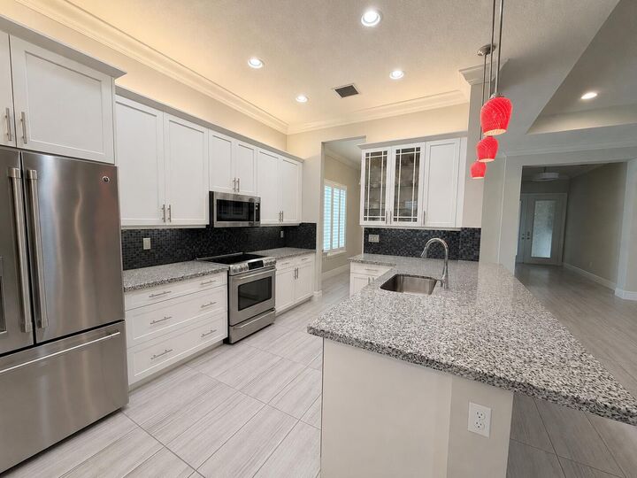 Property Photo:  12600 Copper Mountain Pass  FL 33473 
