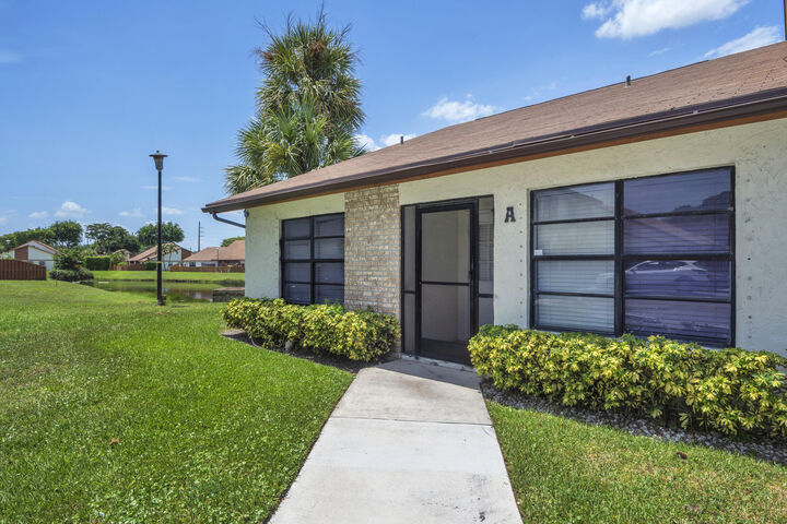 Property Photo: 1020 Parkside Green Drive A FL 33415