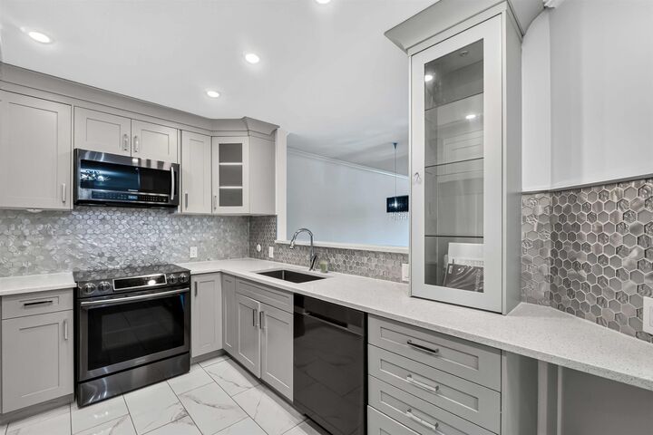 Property Photo: 13680 84 Avenue 404 BC V3W 0T6