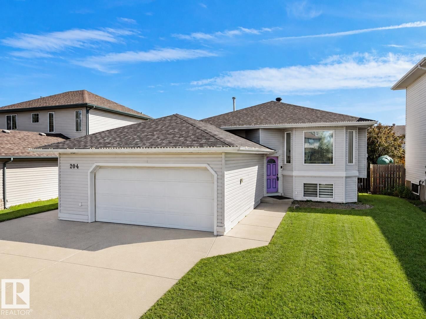 Property Photo: 204 Westmews Drive AB T8L 4J2