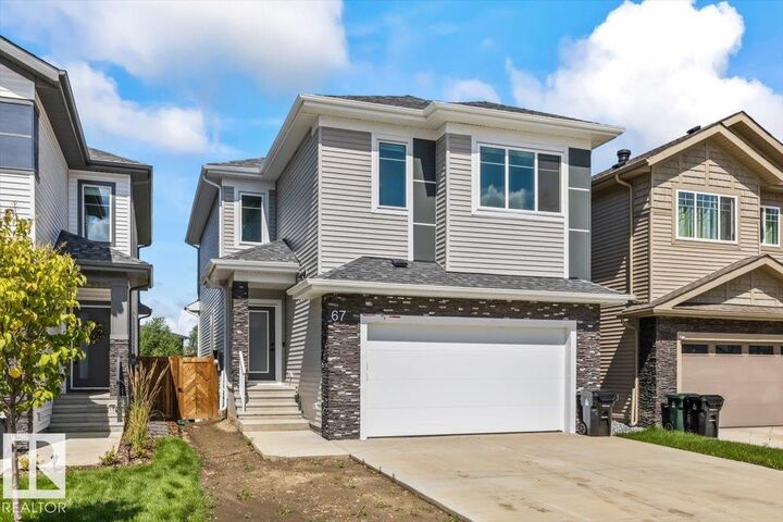 Property Photo: 67 Meadowgrove Lane AB T7X 0W2