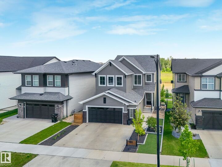 Property Photo: 7151 Edgemont Way NW AB T6M 1K1