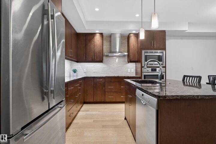 Property Photo: 200 Bellerose Drive 514 AB T8N 7P7