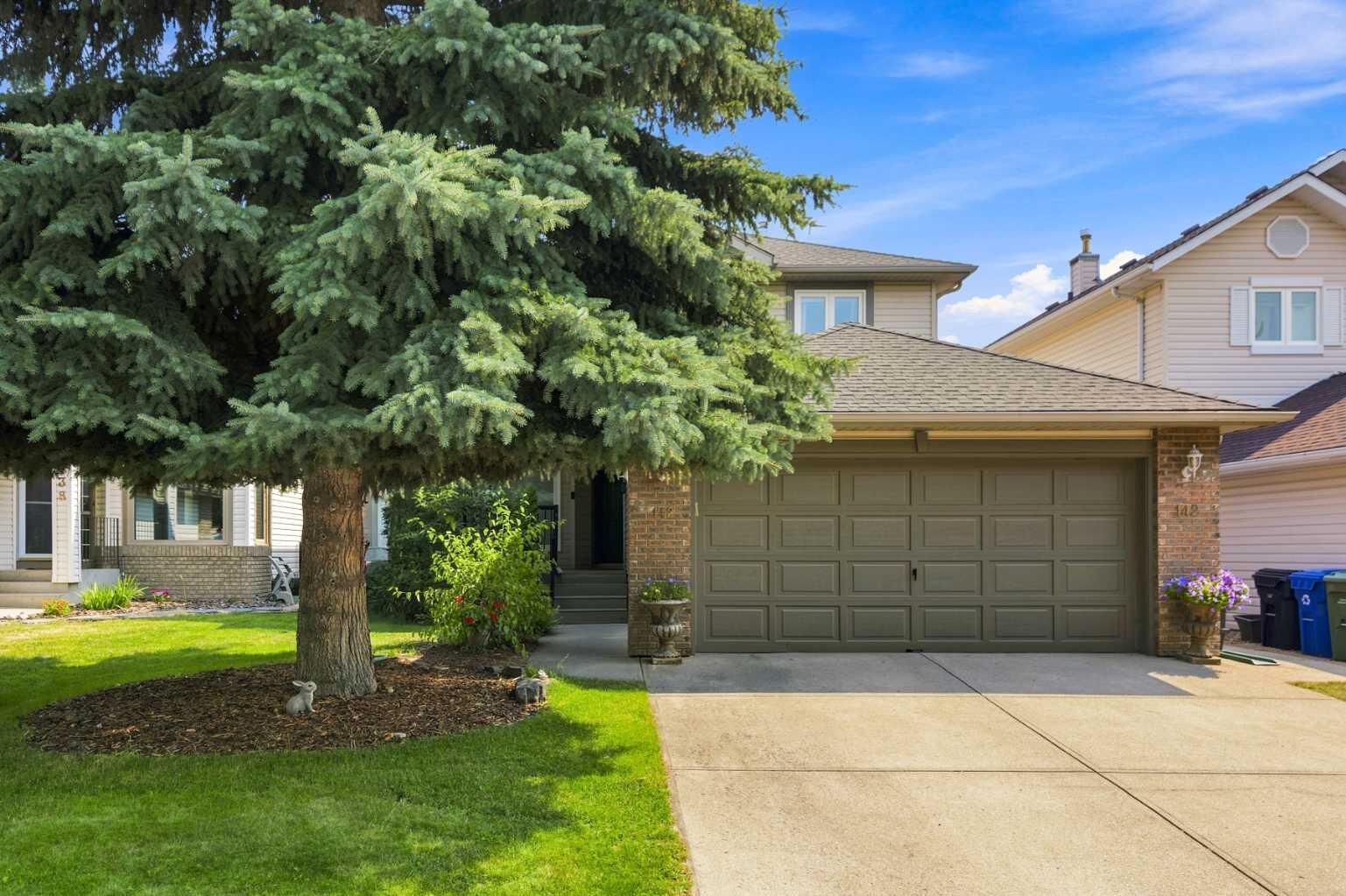 Property Photo: 142 Riverview Circle SE AB T2C 4J9