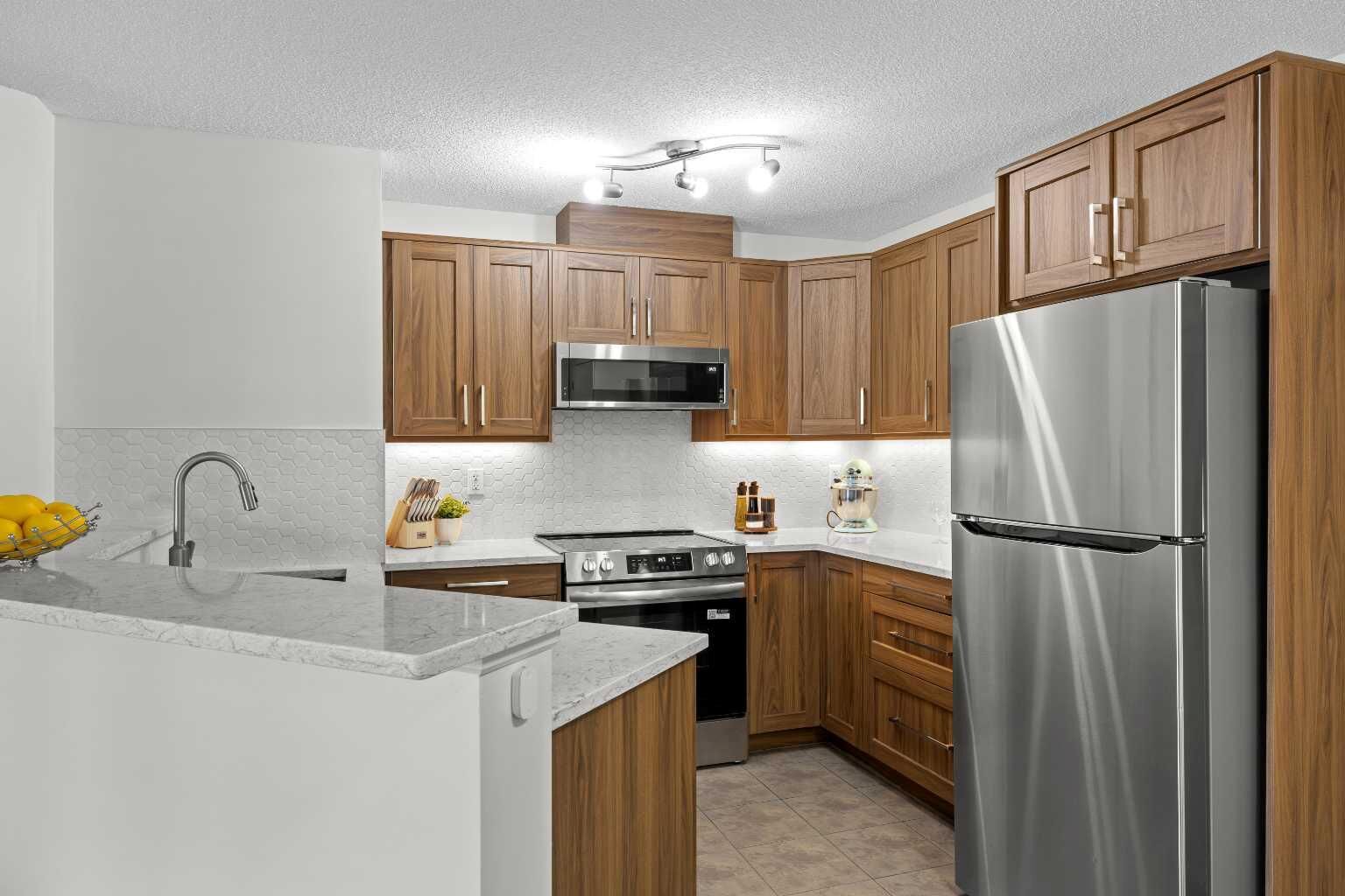 Property Photo:  16969 24 Street SW 5210  AB T2Y 0J8 