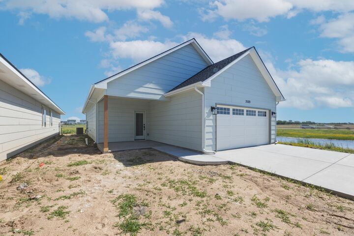 Property Photo:  12012 W Arvada Blvd  KS 67223 